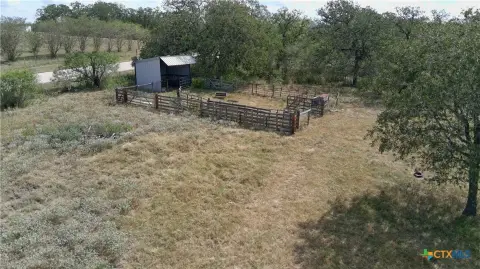 Fenced Agricultural Land With Pond