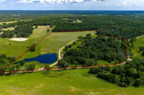 25.76 Acres with Stocked Pond