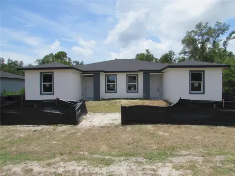 Duplex Requiring Finish Work