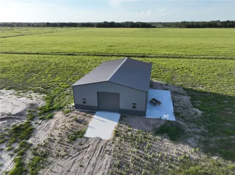 Fenced Agricultural Land with Barn