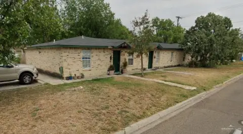 Brick Triplex with Patios