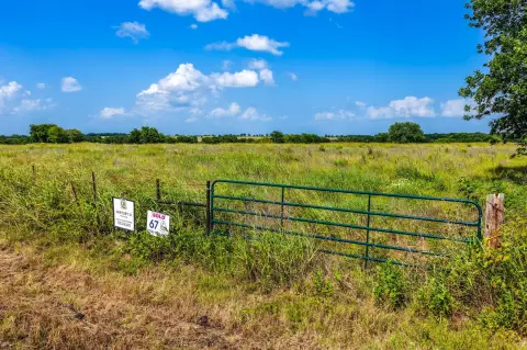 Fenced Acreage with Highway Access