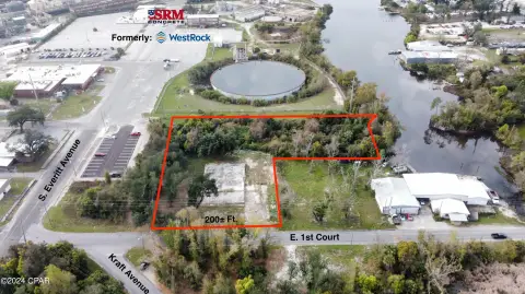 Chain-Link Fenced Commercial Land Site