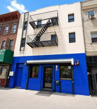Mixed-Use Building with Bar and Apartments