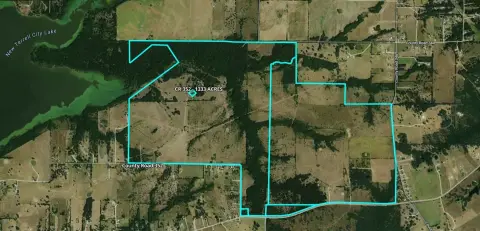 Contiguous Ranch Land with Lake Adjacent