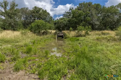 Fenced Agricultural Land with Stock Tank