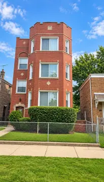Brick Triplex With Three-Car Garage