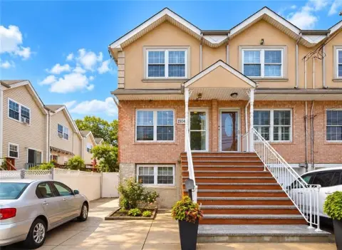 Two-Family Home with Private Driveway