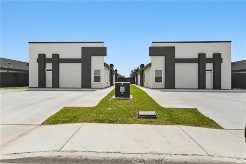 Modern Duplex with Privacy Fence