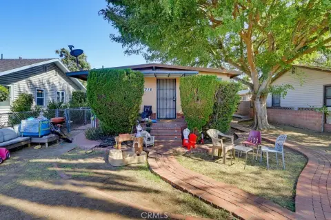 Tenant-Occupied Triplex with Garages