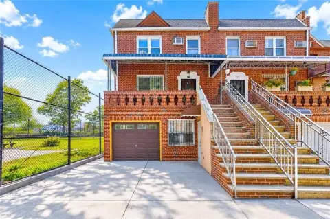 Brick Two-Family Duplex with Garage