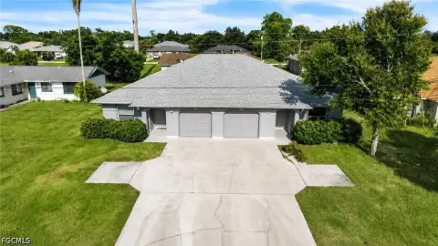 Tenant-Occupied Duplex with Garages