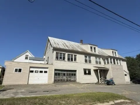 Mixed-Use Property with Attached Garages