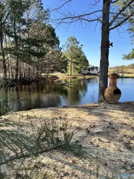 6 Acres with Stocked Pond