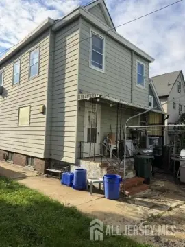 Two-Unit Specialty Property with Porch