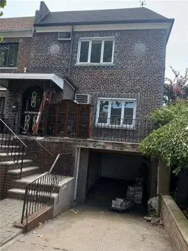 Brick Three-Family Property