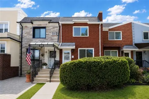 Brick Duplex with Detached Garage