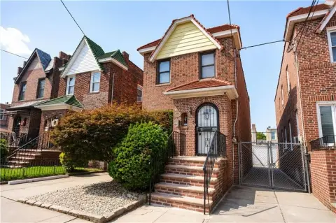 Brick Duplex with Detached Garage