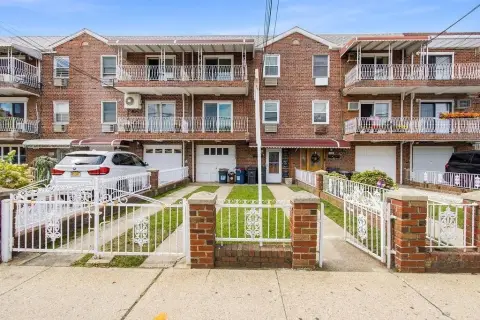 Vacant Brick Duplex with Garage