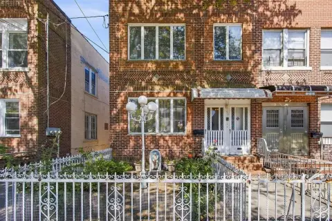 Brick Triplex With Garage