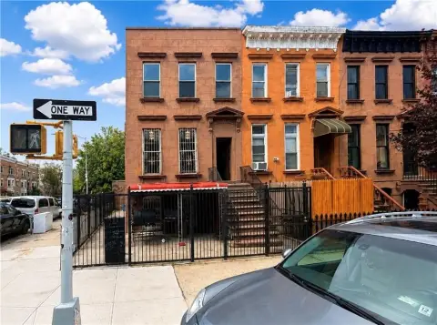 Brick Duplex With Detached Garage
