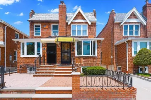 Brick Duplex with Attached Garage
