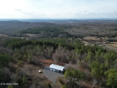 Secluded Mountain Acreage with Improvements