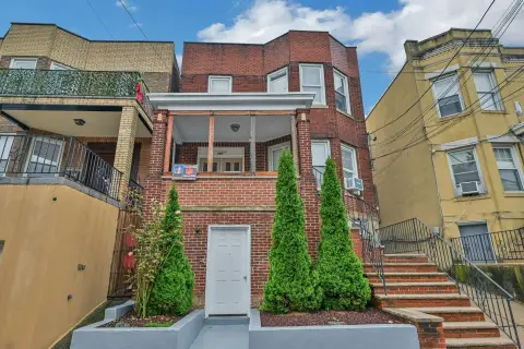 Brick Triplex With Three-Car Garage