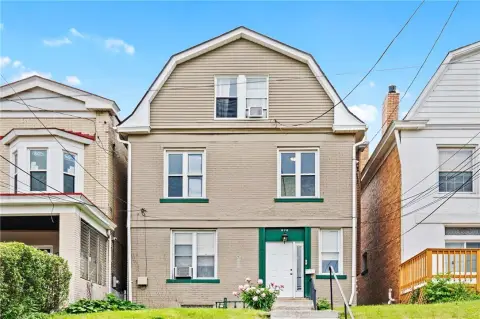 Well-Maintained Triplex with Parking