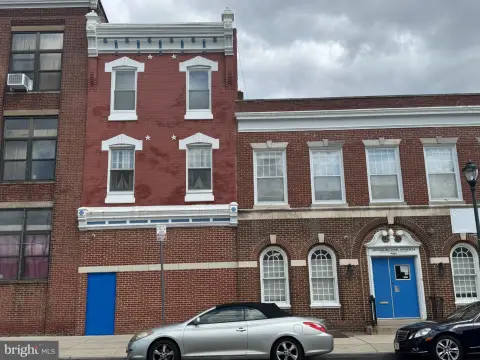 Former Row Home Office Building