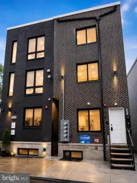 Turnkey Triplex with In-Unit Laundry