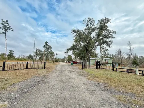 Gated Mobile Home Park with Lakefront Setting