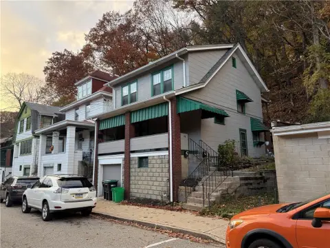 Duplex with Porches and Yard