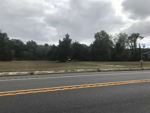 Commercial Land with Rented Log Cabin