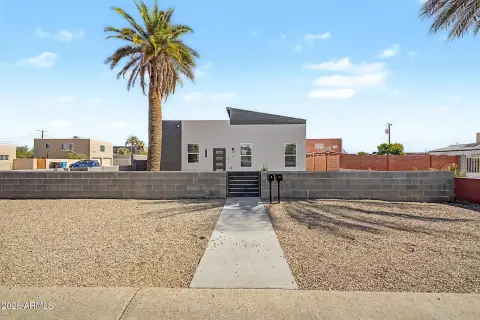 Single-Story Duplex with Carport