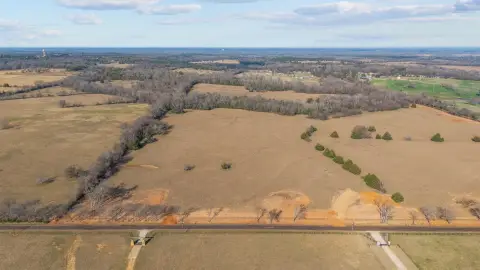 Fenced Farmland with Creek