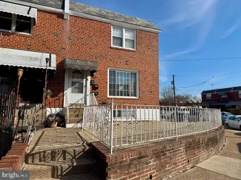 Mixed-Use Triplex with Office Flexibility