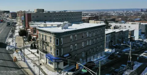 Corner Mixed-Use Building with Retail
