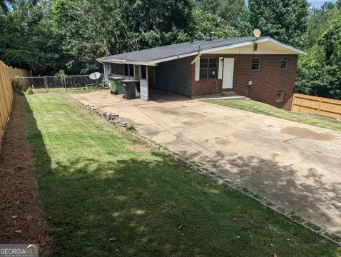 Brick Duplex With Fenced Yards