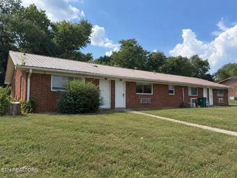 Brick Quadplex with Metal Roof