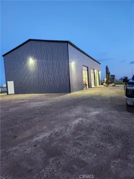 Fenced Agricultural Land With Shop