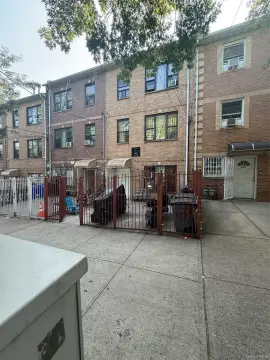 Brick Triplex with Backyard