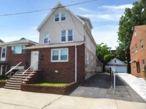 Two-Family Duplex with Detached Garage