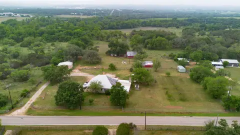 Unrestricted Spicewood Acreage with Historic Home