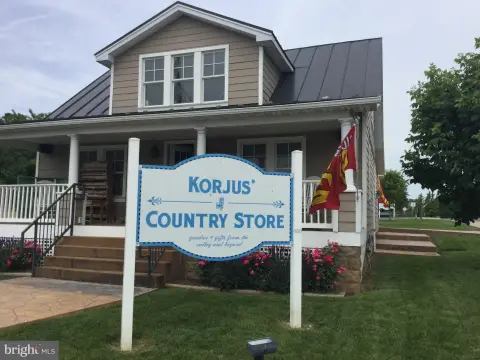 Corner Retail Shop with Upstairs Rooms