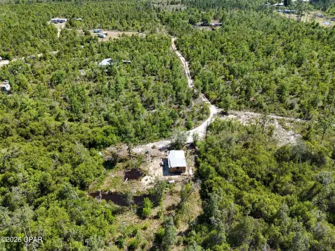 Wooded Recreational Land with Pond