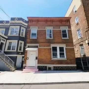 Solid Brick Two-Unit Duplex