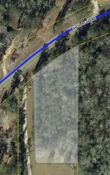 Unrestricted Wooded Lot in Carriere