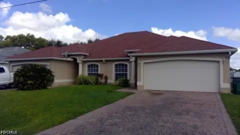 Duplex With Private Garages