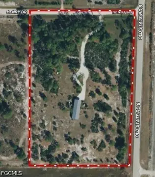 Fenced Agricultural Land with Improvements